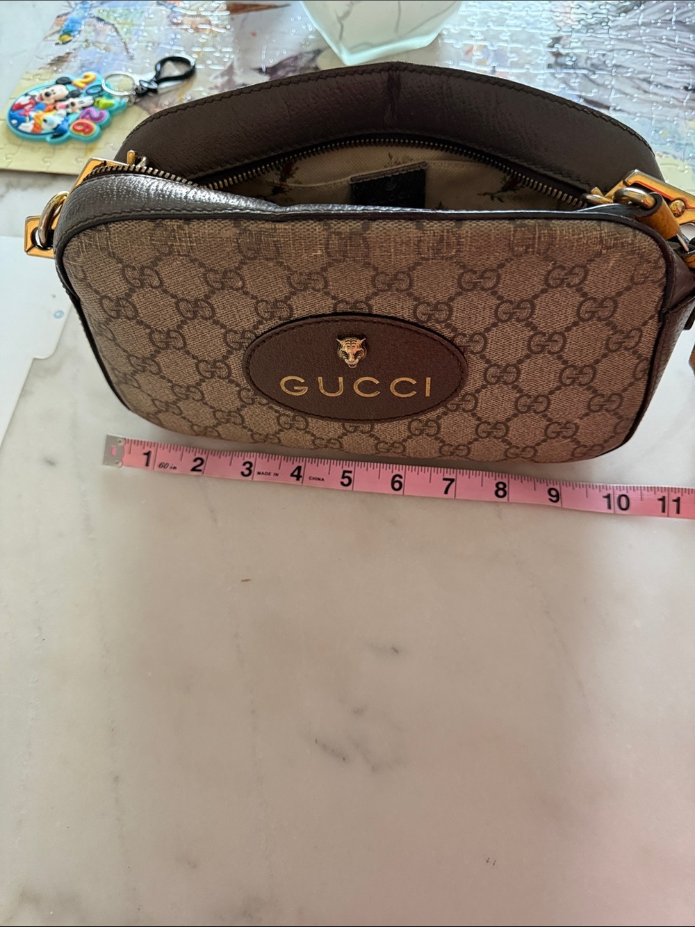 Gucci Beige Brown GG Supreme Crossbody with Gold Logo